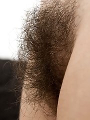 Anissa shows off her petite body and strips naked