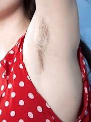 Maia models a red dress and masturbates in bed